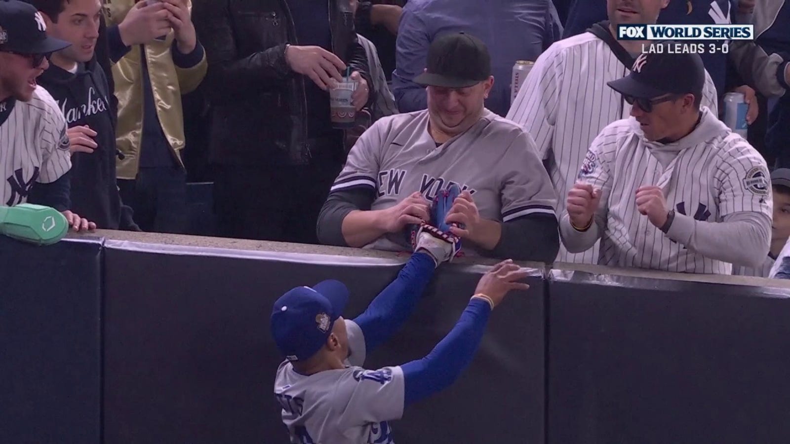 Yankees fan pulls ball out of Mookie Betts' glove in Game 4