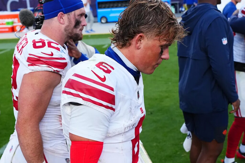 Jaxson Dart’s heartbreaking reaction to Cam Skattebo’s gruesome ankle injury