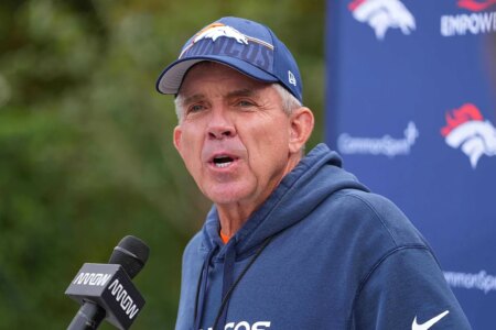 Why did Sean Payton never sign with the Cowboys?