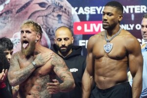 Jake Paul flicks Anthony Joshua’s nipple and nearly loses $650k necklace during faceoff