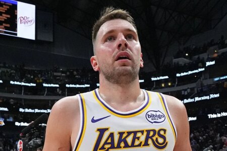 Luka Doncic blatantly turns his head as a dancer walks by at his birthday party