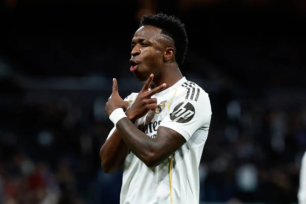 Vinícius Júnior scores 2 and Mbappé-less Real Madrid beats Real Sociedad 4-1 to move top in Spain