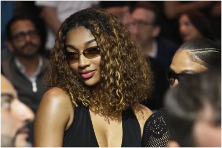 Angel Reese breaks the internet celebrating Valentine’s Day in a bikini surrounded by flowers