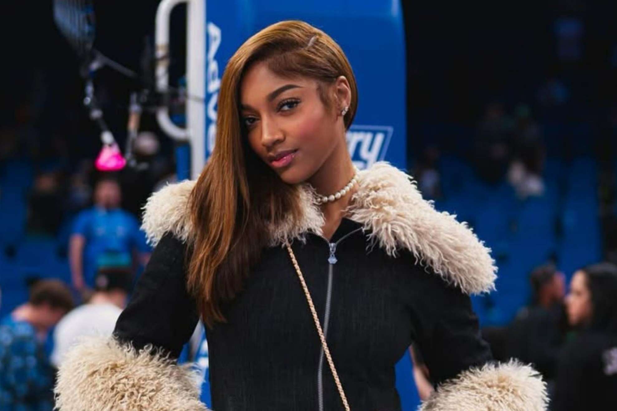 Her height already gives her a competitive edge on the court. Off it, that same stature becomes part of her fashion identity