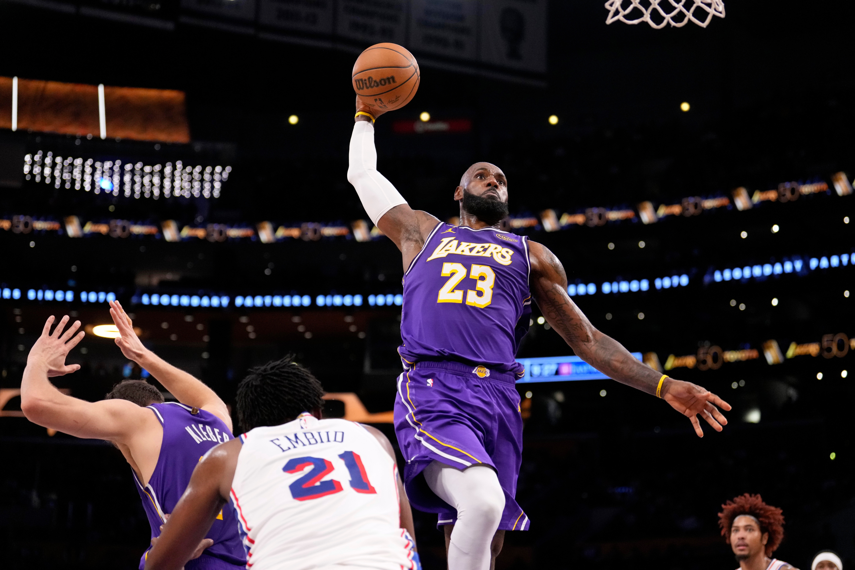 Doncic injured and 'Hillbilly Kobe' rescues Lakers from Joel Embiid's clutches
