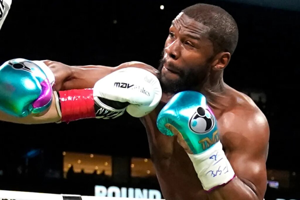 Mayweather will fight a multi-time kickboxing champion before his rematch with Pacquiao