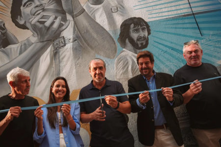 More than 200 people celebrate the unveiling of the first “Heroes of ’86” mural in the United States in Miami