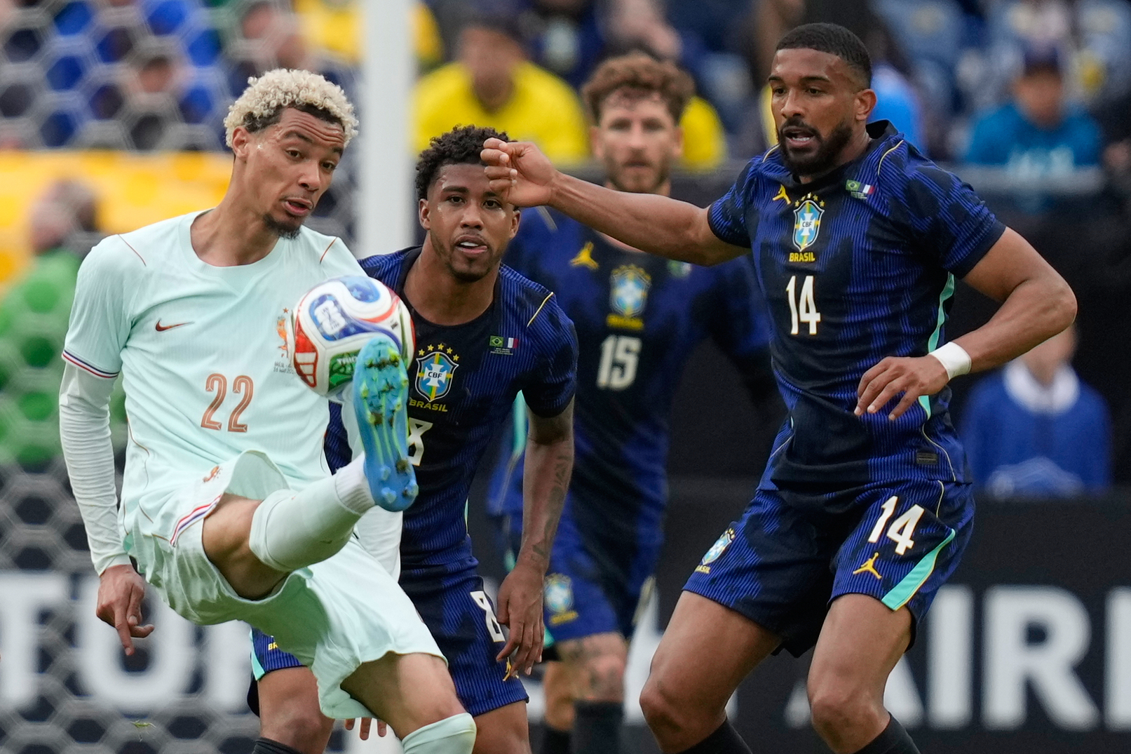 Hugo Ekitike of lt;HIT gt;France lt;/HIT gt; controls the ball as Brazil's Bremer, right, looks on during the international friendly soccer match between Brazil and lt;HIT gt;France lt;/HIT gt; in Foxborough, Mass, Thursday, March 26, 2026. (AP Photo/Charles Krupa)