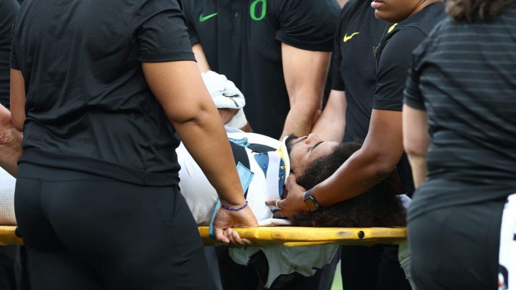 Dante Moore Carted Off Field After Hard Hit, USC’s Desman Stephens III Ejected